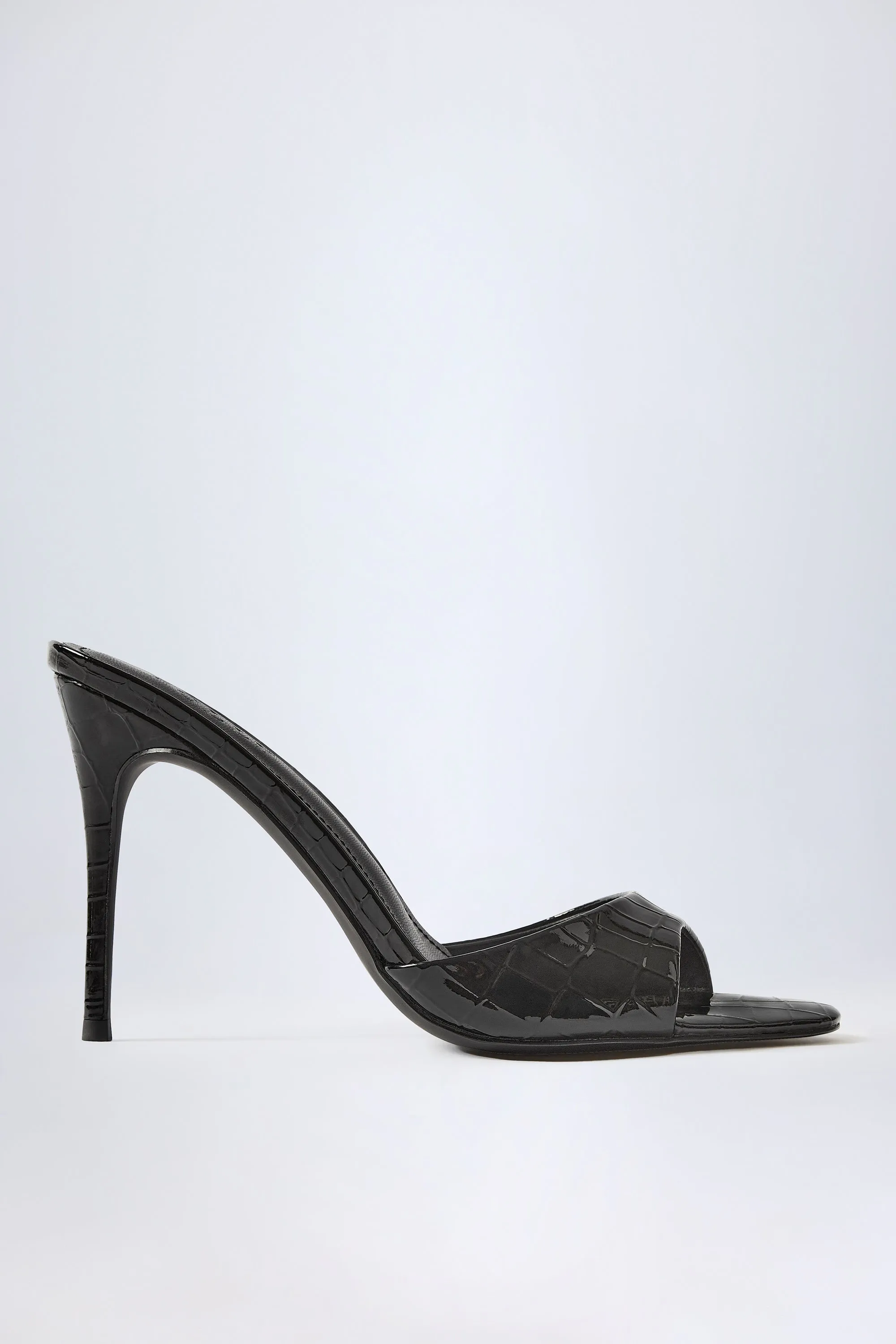 Almond-Toe Heeled Mules in Croc Patent Black